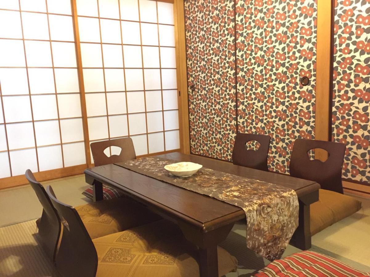 Yumeji Guest House Osaka Bagian luar foto