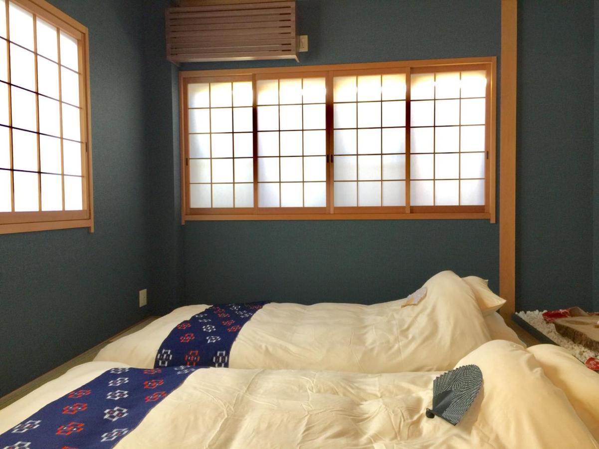 Yumeji Guest House Osaka Bagian luar foto
